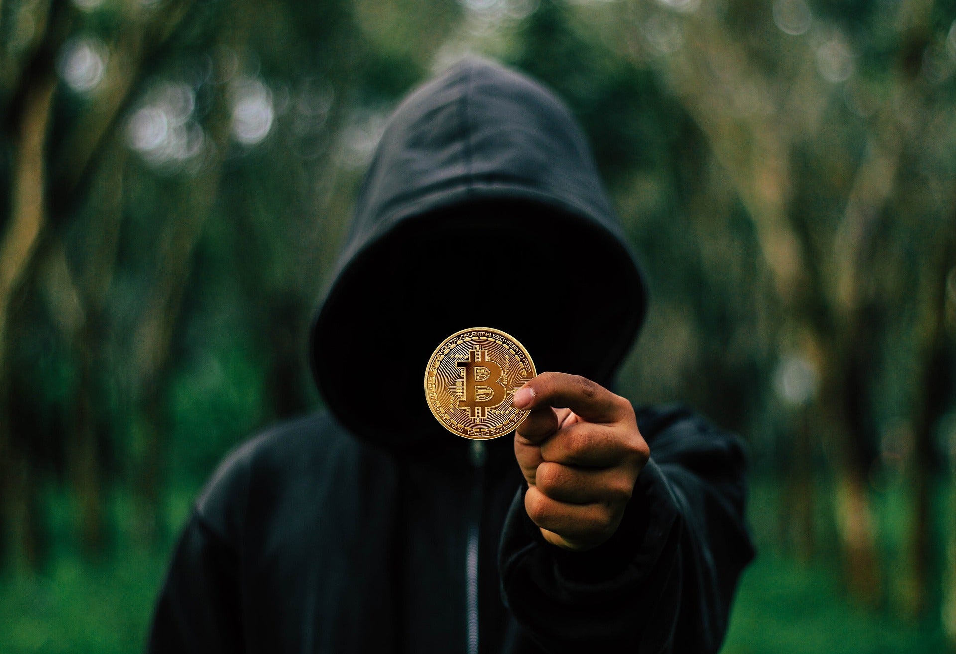 Jamie Dimon Is Bullish On Blockchain, But Says Bitcoin Is A 'Hyped-Up Fraud' — And Satoshi Nakamoto Might Be Waiting To 'Laugh At You All'  - Benzinga